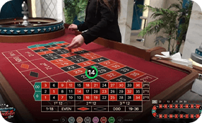 Live roulette wheel and betting table